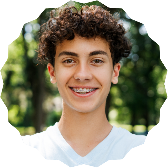 boy with braces smiling